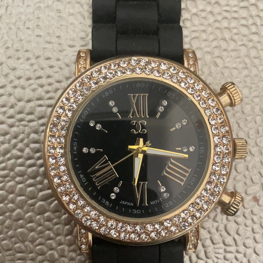 black and gold Watch